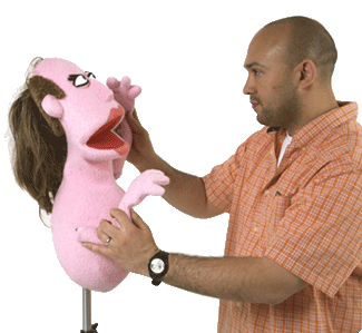 Kanja building a puppet.